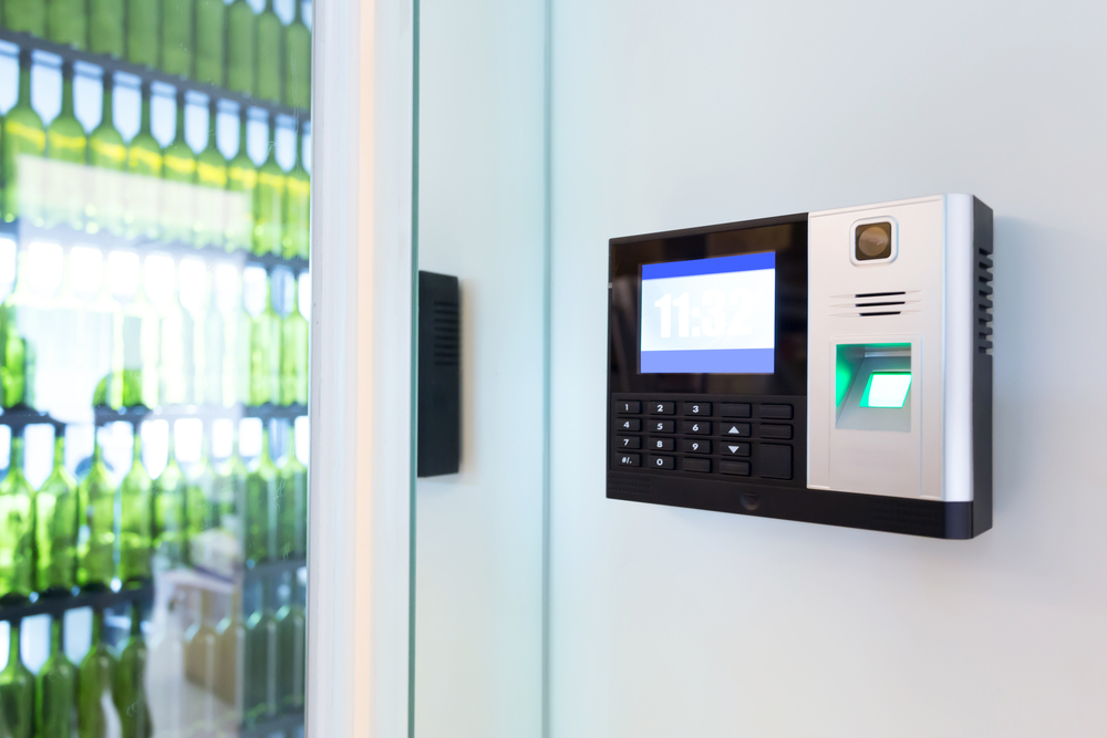 a security gateway with a card reader on the wall